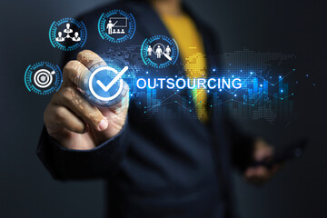 Outsourcing concept with businessman tick on checkmark to approved hire outsource employee or manpower to be a staff in company with contract periods - obrazy, fototapety, plakaty