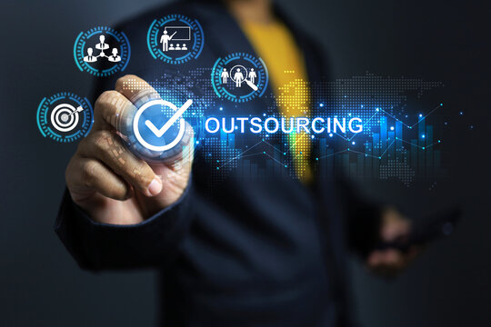 Outsourcing concept with businessman tick on checkmark to approved hire outsource employee or manpower to be a staff in company with contract periods