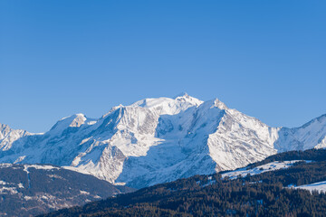 Mont Blanc massif after snowfall in Europe, France, Rhone Alpes, Savoie, Alps, in winter on a sunny day.