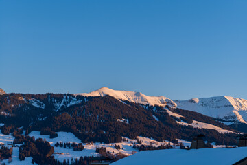 Mont Joly at sunset in Europe, France, Rhone Alpes, Savoie, Alps, in winter, on a sunny day.