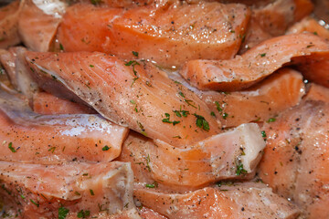 Pieces of red fish fillet. Salmon fillet, close-up.