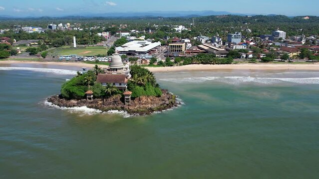Golden Island on the coast of Sri Lanka in Matara. Top view, aerial video filming.