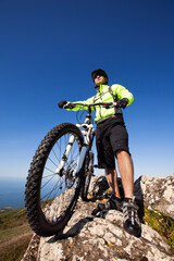 Obraz premium Mountain biker riding on his btt bike