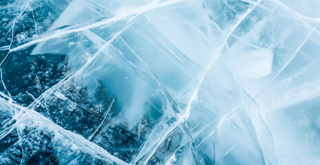 ice texture cracks lake, abstract background winter ice transparent blue. Closeup of a cracked ice texture.
