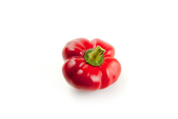 Whole red bell pepper isolated on white background with clipping path. .