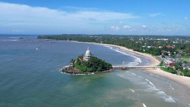 Golden Island on the coast of Sri Lanka in Matara. Top view, aerial video filming.