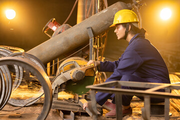 Woman worker working at construction site
