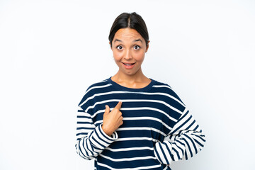 Young hispanic woman isolated on white background with surprise facial expression