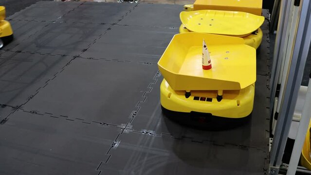 Autonomous Robot transportation in warehouses. automated package sorting. Boxes with order moving on conveyor. automation concept. cargo distribution warehouse