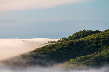 Dramatic Mountainous Horizon - A picturesque scene of towering peaks and valleys, creating a dramatic and awe-inspiring landscape