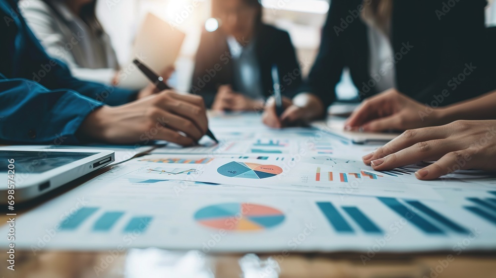 Canvas Prints Teamwork with business people analysis cost graph on desk at meeting room 