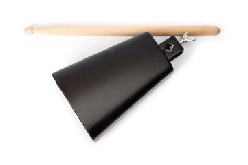 Cowbell percussion musical instrument, black metal with a wooden stick.