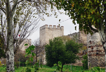 Ruins ancient fortress walls of Constantinople, known as the Theodosian Walls - 698578401