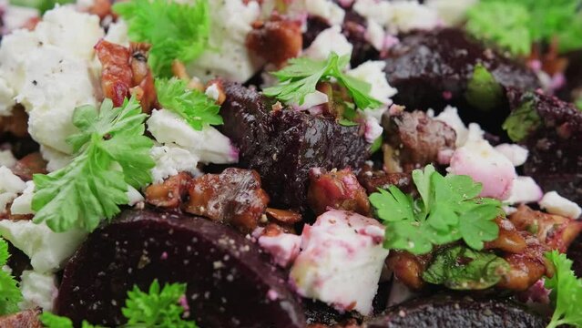Healthy Beetroot salad with feta cheese and walnuts. Rotating video.