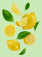 Fototapeta premium Lemon with leaves isolated on white background