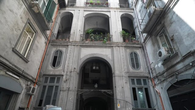 View of old cozy street in Italy. Architecture and landmark of Rome. Milan, Napoly. Street in an old italian town, walking on empty alley of traditional village, Narrow alley in traditional district.