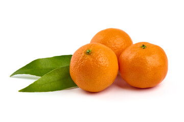 Ripe tangerines with leaves, isolated on a white background.