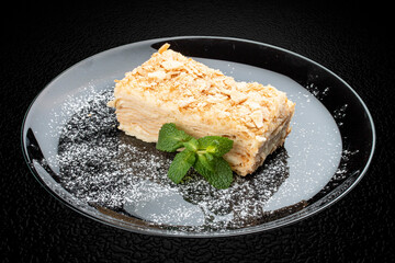 Napoleon cake. Layered pastry with custard. Isolated image