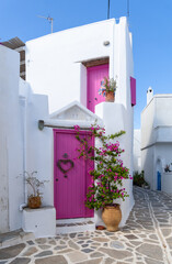 beautiful Marpissa, with a famous pink door on insta. Paros, Greece