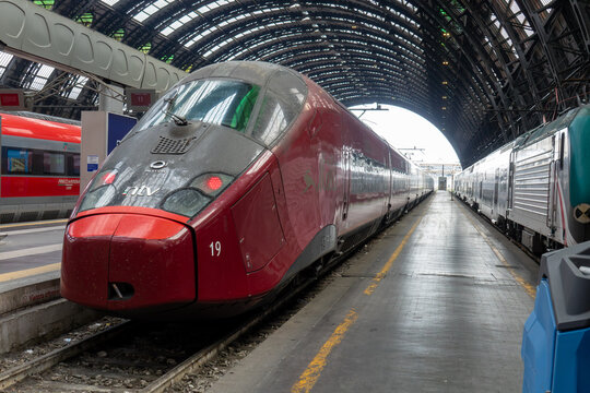Milan, Italy - July 22, 2023: Italo high-speed trains of Nuovo Trasporto Viaggiatori NTV in Milano Centrale railway station