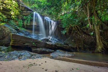 Samrongkiat Waterfall Arboretum in dry evergreen forest. It is medium sized waterfall in Khun Han, Si Sa Ket, Thailand.
