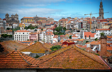 Porto, Portugal old town ribeira aerial promenade view with colorful houses, Douro river and boats