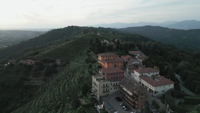 Aerial shot of the little village of Montevecchia, Italy. Stunning architecture and beautiful forests around. 4K drone shot.
