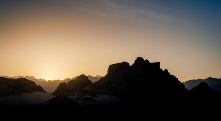 sunset with blue sky and clouds in the mountains in the desert of Egypt