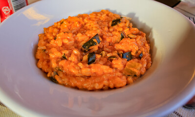 Close-up of the classic Risotto with sunlight. Italian food and cultures. Food concept.