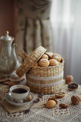 A photo of sweet nuts with condensed milk on the table.