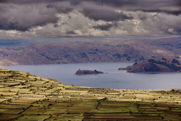 Lake Titicaca is a large, deep lake in the Andes on the border between Peru and Bolivia. It is...