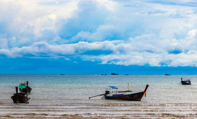 Obraz premium Tropical paradise turquoise water beach longtail boat Krabi Thailand.