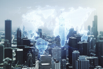Double exposure of abstract digital world map hologram on Chicago office buildings background, big...