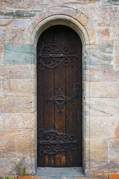 Hove church, an old stone church in Vikoyri, Norway, during a moody, dramtic day