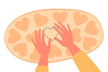 Homemade cookies. Top view on hands making cookies cartoon vector illustration. Festive shaped cookies. Process of making sweet cookies use heart cookie cutter