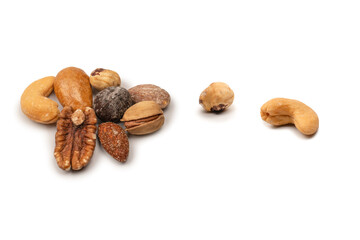 A group of almonds, pistachios, walnuts, macadamia, cashews.