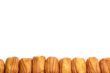 Sweet eclairs isolated on a white background.
