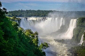 Water cascading over multiple falls at the Iguacu falls in Brazil