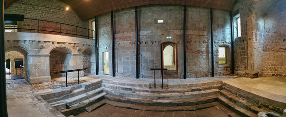 Panoramic inside view at the D. Afonso Henriques Roman bathhouse, restored building transformed into a museum, interior medicinal and thermal baths chamber - obrazy, fototapety, plakaty