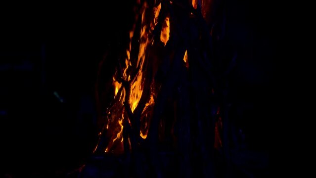 Fire flame burning on camping of dark blackg background
