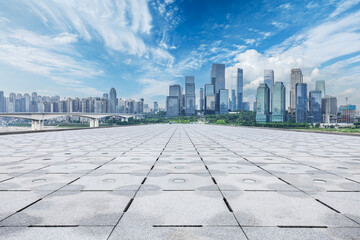 Empty square floor and urban glass building complex