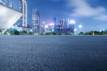 Fototapeta premium Asphalt road with city buildings skyline in Guangzhou