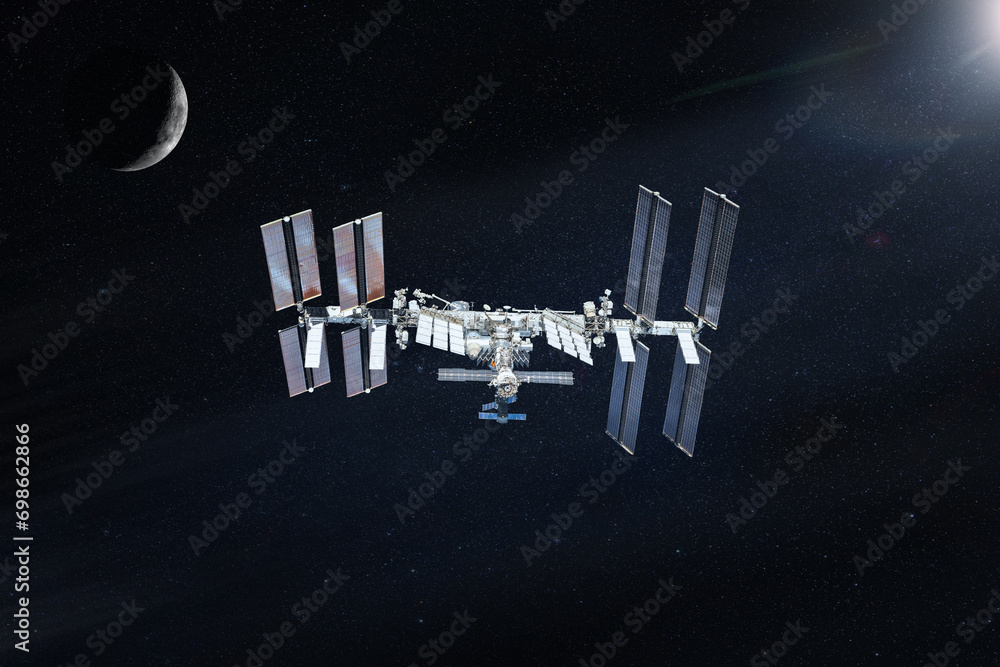 Wall mural international space station in outer space with moon. elements of this image furnished by nasa.