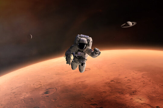 Spaceman in outer space in low-Mars orbit. Elements of this image furnished by NASA.