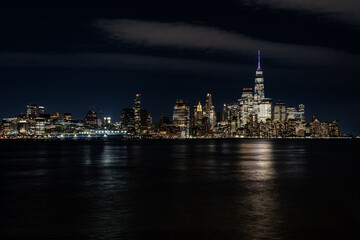 Fototapeta na wymiar Night image of Lower Manhattan skyline, New York City, from Hoboken, NJ.