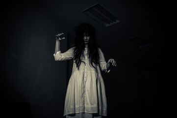 Portrait of asian woman make up ghost,Scary horror scene for background,Halloween festival...