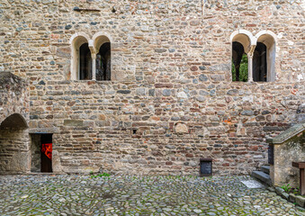 T yrol castle in South Tyrol. Facade with  Bifora tye window with central column. Medieval...