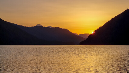 Breathtaking allure of sunset at alpine lake Weissensee in remote Austrian Alps in Carinthia....