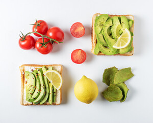Variation of healthy breakfast sandwiches with avocado and toppi