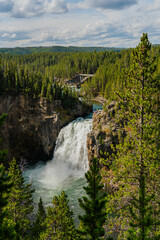 Fototapeta premium Chittenden Memorial Bridge near the Canyon Village Lower Falls of the Grand Canyon on the Yellowstone River at Artist point, Yellowstone National Park, Wyoming, USA 